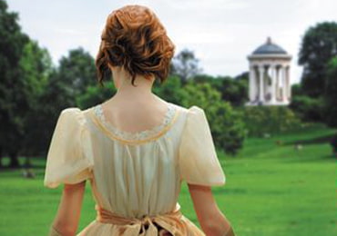 Picture of a young lady in a dress at an estate