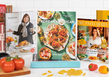 Featured book covers including Ina Garten's Go-To Dinners, The Pasta Queen, Korean American